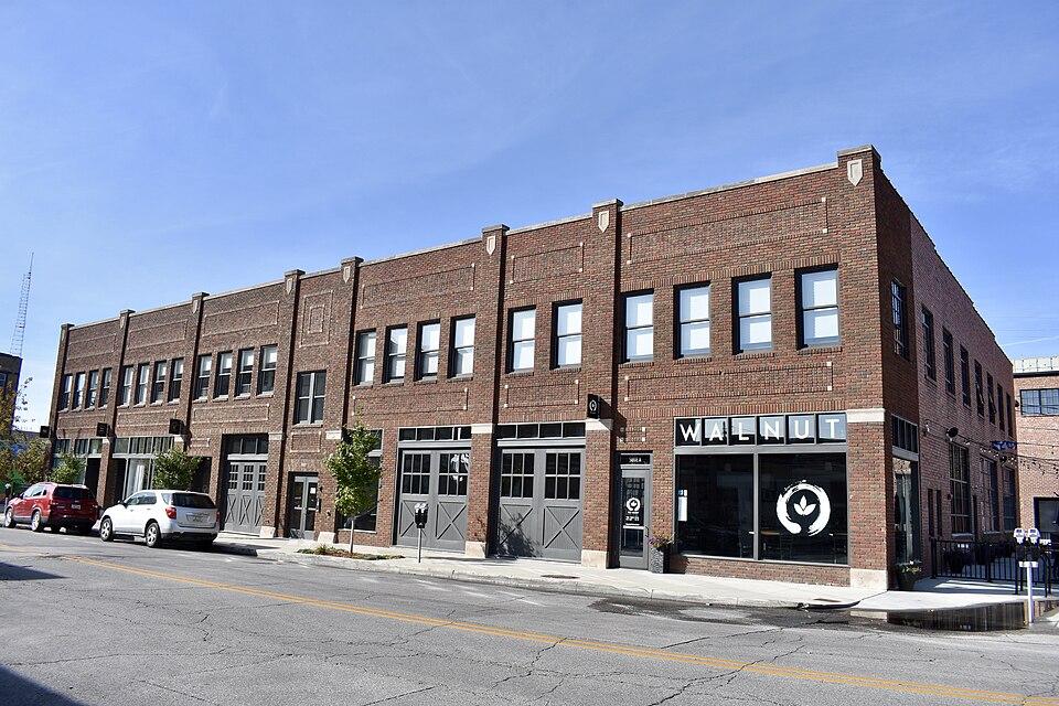 Photograph of Walnut Tire and Battery Co.-Globe Publishing Company Building