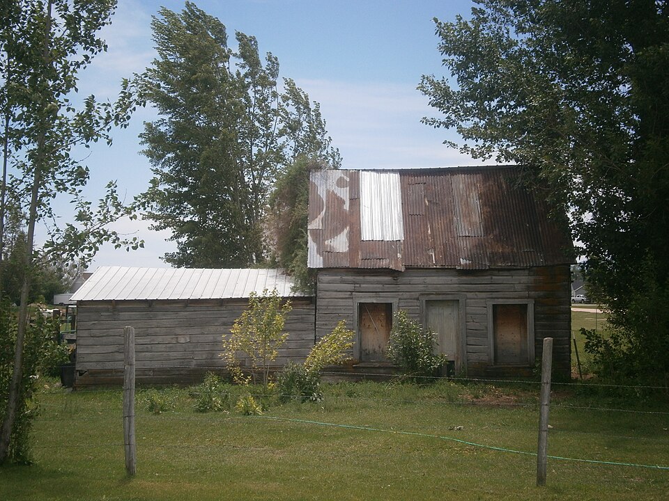 Photograph of Keller House and Derrick