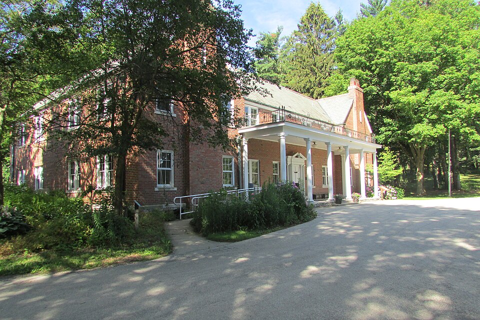 Photograph of Studebaker Clubhouse and Tree Sign