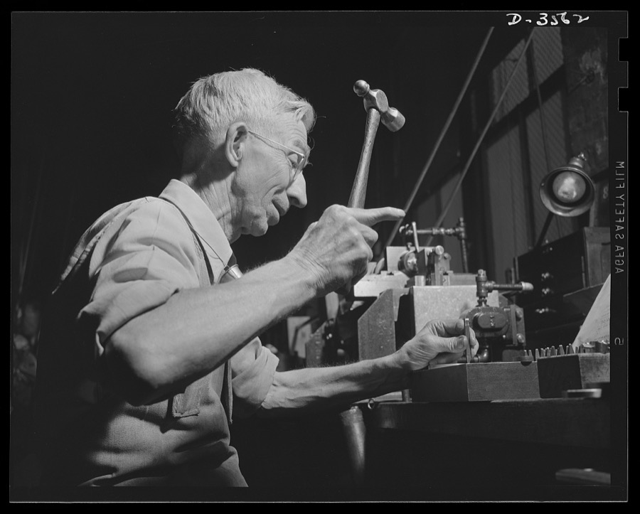 Conversion. Watch cases to war production. Skill and experience back the production drive. A die maker in a converted Kentucky watch case factory brings rare ability to the plant's new job of making compass cases, fuse baffles, machine gun parts and other war essentials. Wadsworth Watch Company, Louisville, Kentucky