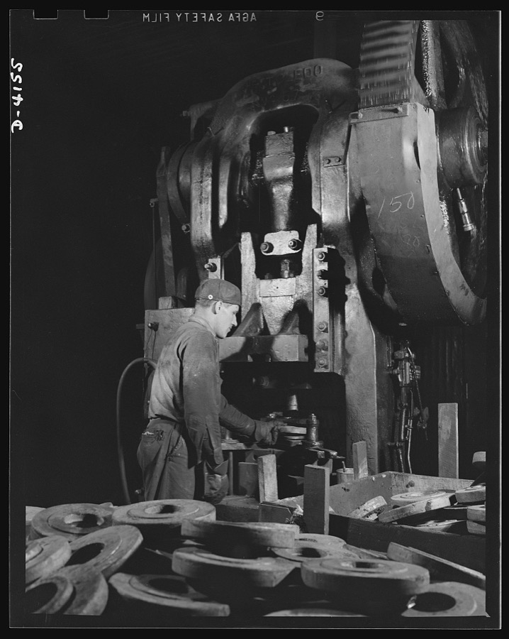 Production. Marine boilers. A big press performs an operation on heavy flanges in a Midwest plant which has converted all its facilities to war production