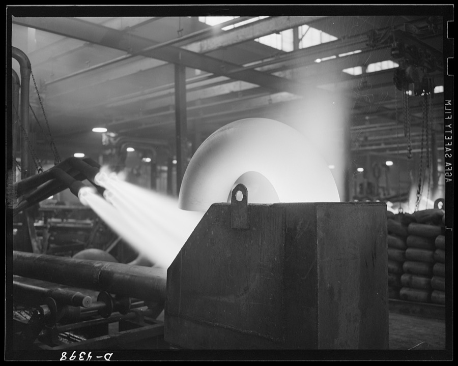 Production. Pipe fittings. Large pipe elbows for the Army are formed in a Midwest plant by heating lengths of pipe with gas flames and forcing them around a die. Tube Turn Incorporated