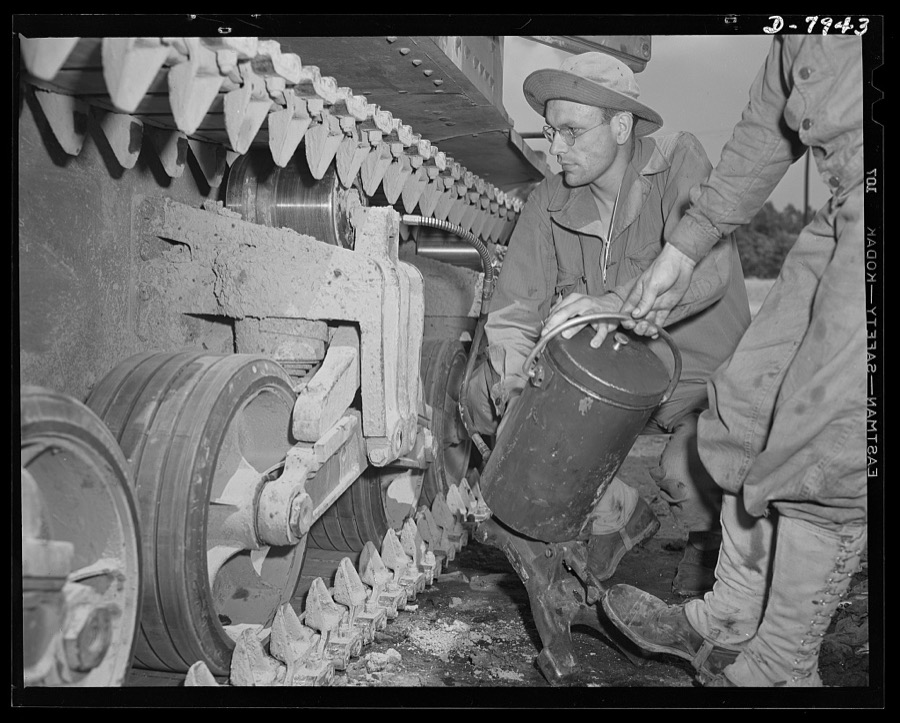 Fort Knox. Maintenance of mechanized equipment. Lubricating the bogie wheels of an M-3 tank at Fort Knox, Kentucky. The Army is very particular about its equipment and one of the first lessons the recruit learns is to give each vehicle the attention it requires