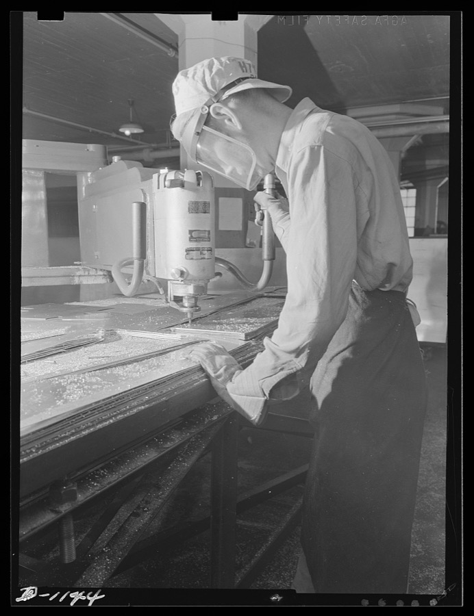 Aluminum. Reynolds Metal Company, Louisville, Kentucky. Fabrication of air-craft parts with high speed tools. Aluminum is a vitally important material in the production of the huge quantities of planes required under the national defense program
