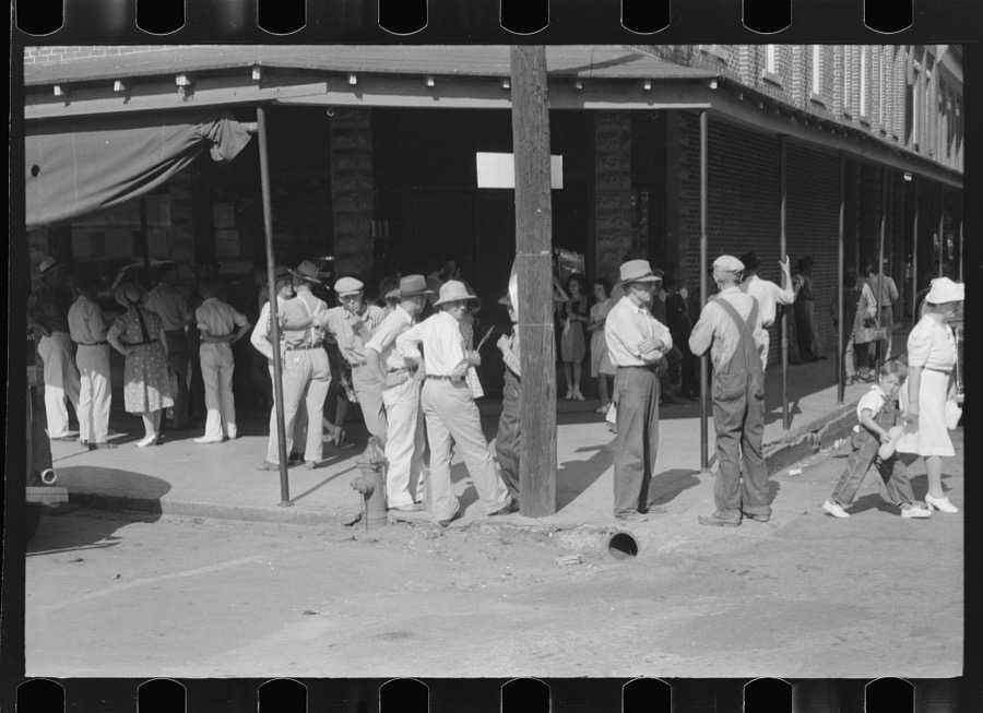 Farmers in front of store on Saturday afternoon in Cave City [actually Horse Cave], Kentucky