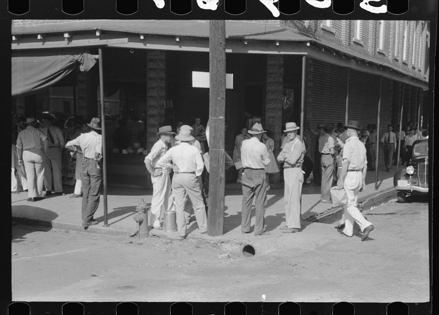 Farmers in front of store on Saturday afternoon in Cave City [actually Horse Cave], Kentucky