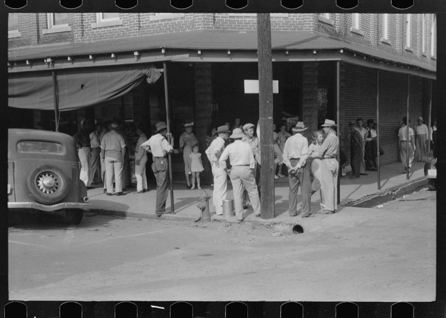 Farmers in front of store on Saturday afternoon in Cave City [actually Horse Cave], Kentucky