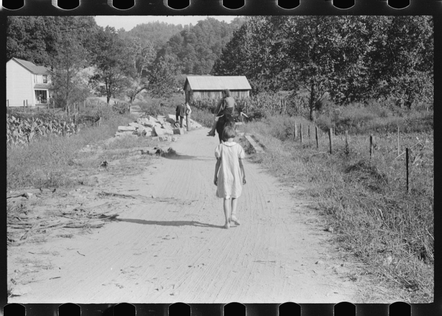 Relatives and friends of the family of the deceased going home from a memorial meeting in the mountains near Jackson, Kentucky. See general caption no. 1