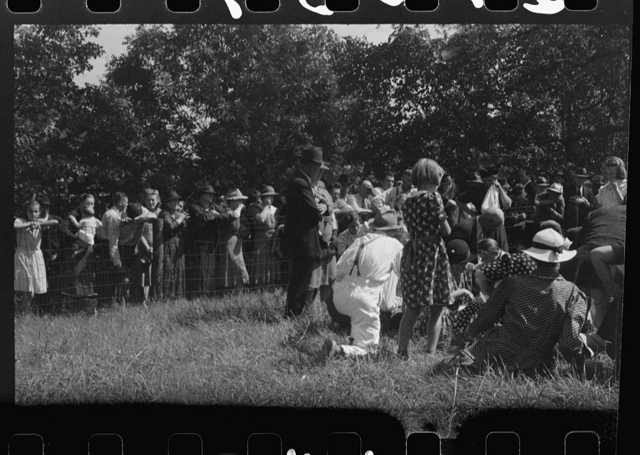 Friends of the deceased's family, at an annual memorial meeting in the family cemetery. In the mountains near Jackson, Kentucky. See general caption no. 1