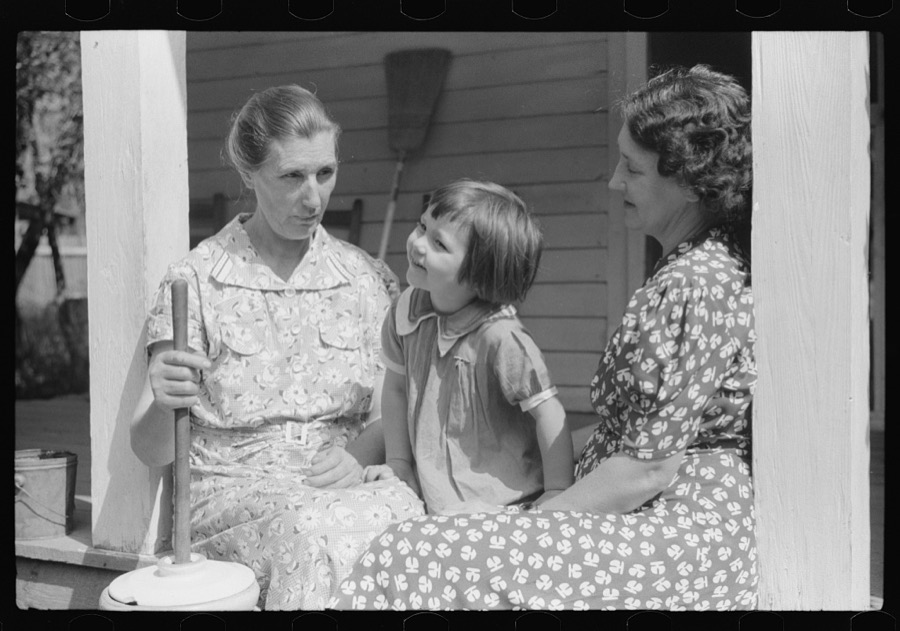 Mountain woman on porch near Burton's Fork, Kentucky River, near Jackson, Kentucky