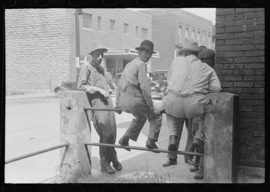 Farmers hanging in front of stores on Saturday, Jackson, Kentucky