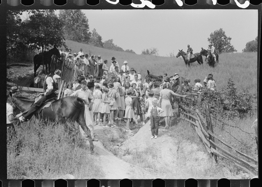 Relatives and friends of the family of the deceased going home from a memeorial meeting in the mountains near Jackson, Kentucky. See general caption no. 1