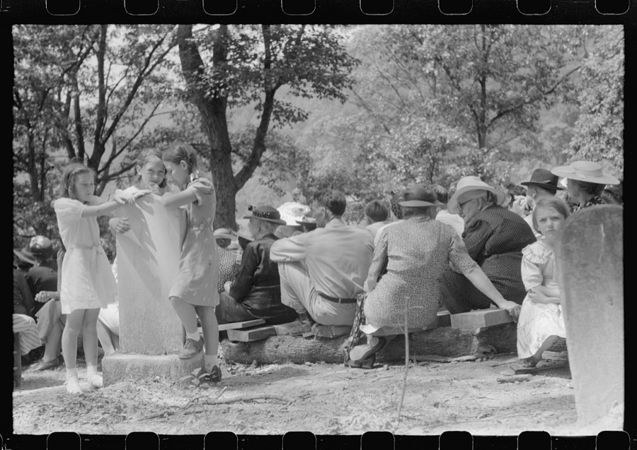 Friends of the deceased's family, at an annual memorial meeting in the family cemetery. In the mountains near Jackson, Kentucky. See general caption no. 1