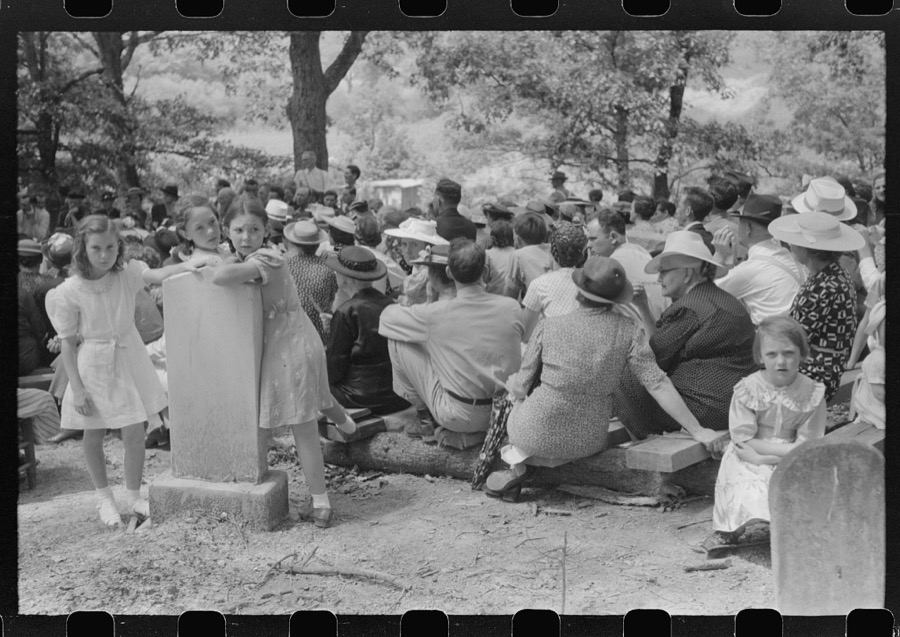 Friends of the deceased's family, at an annual memorial meeting in the family cemetery. In the mountains near Jackson, Kentucky. See general caption no. 1