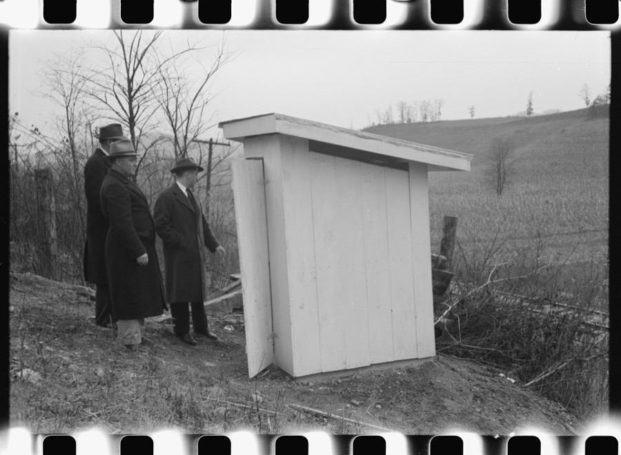 Dr. R.B. Fulks, county health officer, John E. Hale, contractor and builder of sanitary units, and B.H. Pitt, inspector of sanitary units, making a sanitation inspection on the farm of Hobert Hammons, FSA (Farm Security Administration) borrower. Southern Appalachian Project, near Barbourville, Knox County, Kentucky