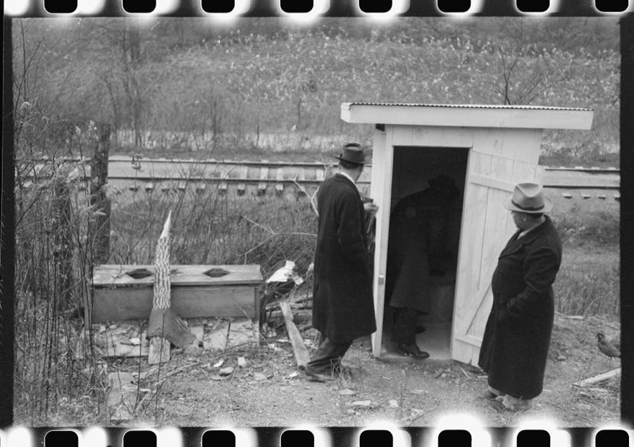 Dr. R.B. Fulks, county health officer, John E. Hale, contractor and builder of sanitary units, and B.H. Pitt, inspector of sanitary units, making a sanitation inspection on the farm of Hobert Hammons, FSA (Farm Security Administration) borrower. Southern Appalachian Project, near Barbourville, Knox County, Kentucky