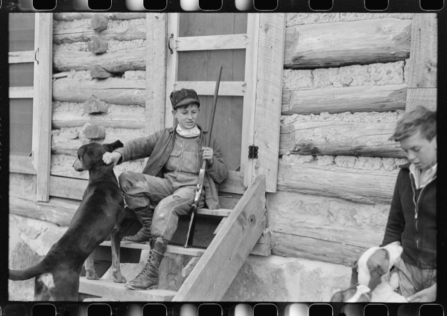 FSA (Farm Security Administration) borrower's son and his friend. They had just returned from hunting. Knox County, Kentucky