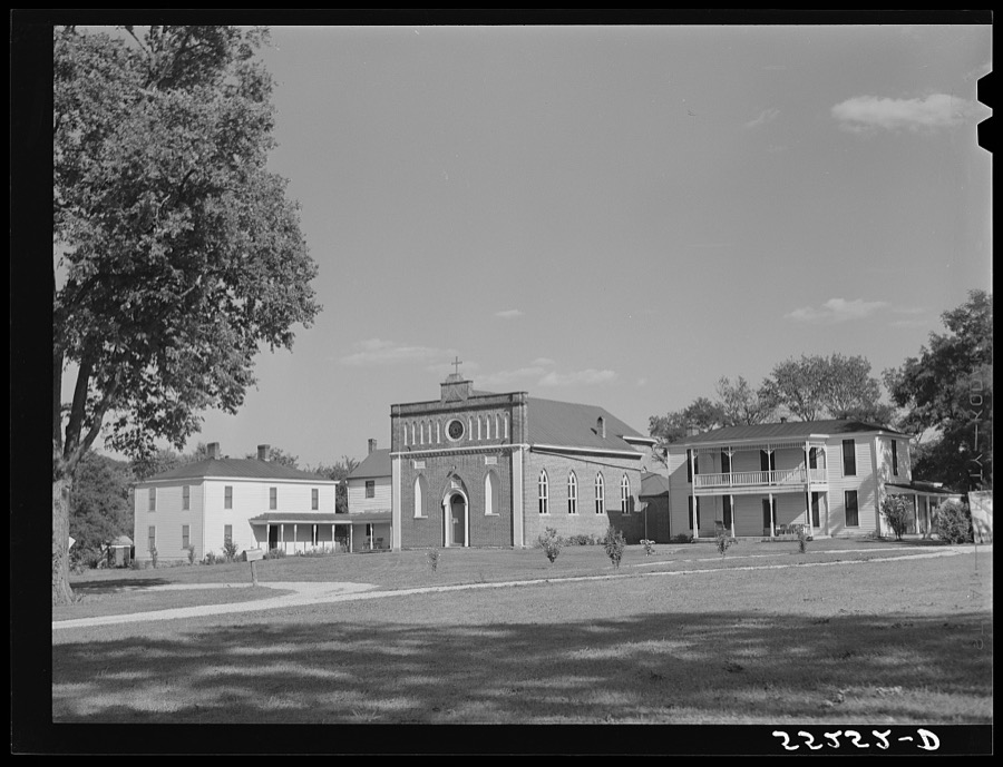 church and rectory on the grounds of Saint Thomas' Church where a picnic is to be held. Near Bardstown, Kentucky