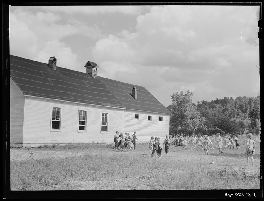 Two-room school house near Morehead, Kentucky. In these mountain areas the school term begins in June and goes through January, because in the late winter and spring months the weather is so severe and roads so bad and children's' clothing is too inadequate