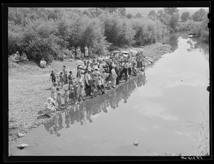 Members of the Primitive Baptist Church in Morehead, Kentucky, attending a creek baptizing by submersion