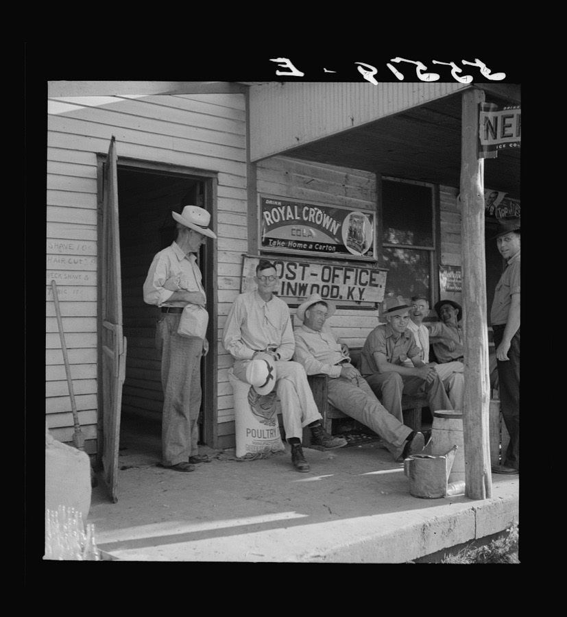 Farmers exchanging news and greetings in front of post office in Linwood, Kentucky