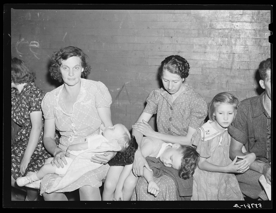 Many parents and young people from the school and nearby communities attend the pie and box supper, given by the school to raise money for additional repairs and supplies. Each box or pie is auctioned off to the highest bidder, sometimes bringing a good deal, since the girl's "boyfriend" usually wins and has the privilege of eating it with her afterwards. Quicksand school, Breathitt County, Kentucky