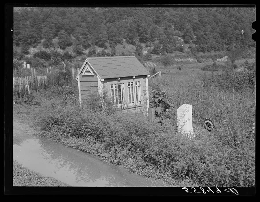 Graveyard near Hazard, Kentucky, with individual houses where the soul is supposed to rest