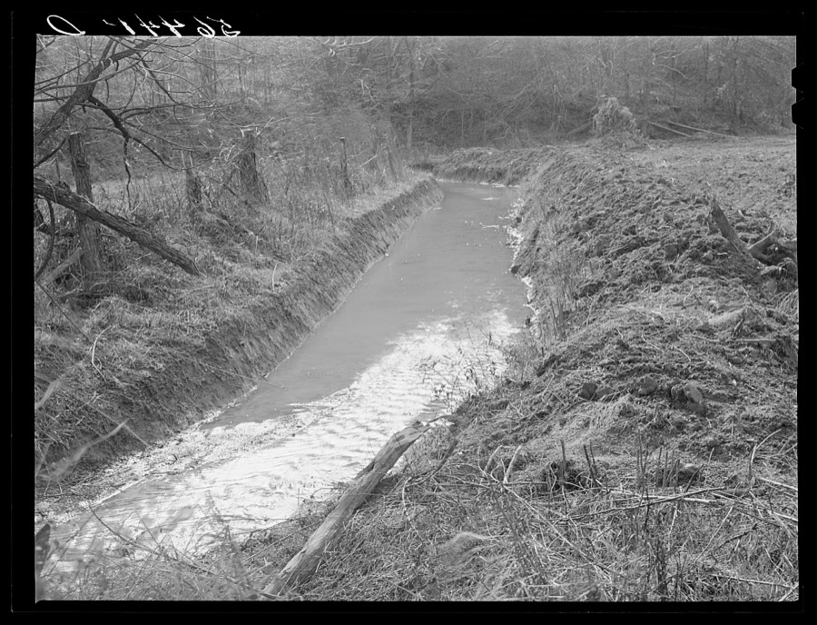 Many drainage ditches have been made and creeks cleaned out and land cleared on the creek bottom land of the farms of FSA (Farm Security Administration) borrowers. Southern Appalachian Project near Barbourville, Knox County, Kentucky