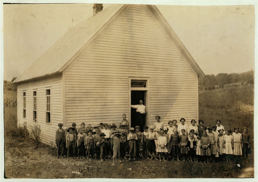 Red Bud School. County Supervisor in doorway. Teacher thought 20 absent on account of work, etc.  Location: Rockcastle County, Kentucky