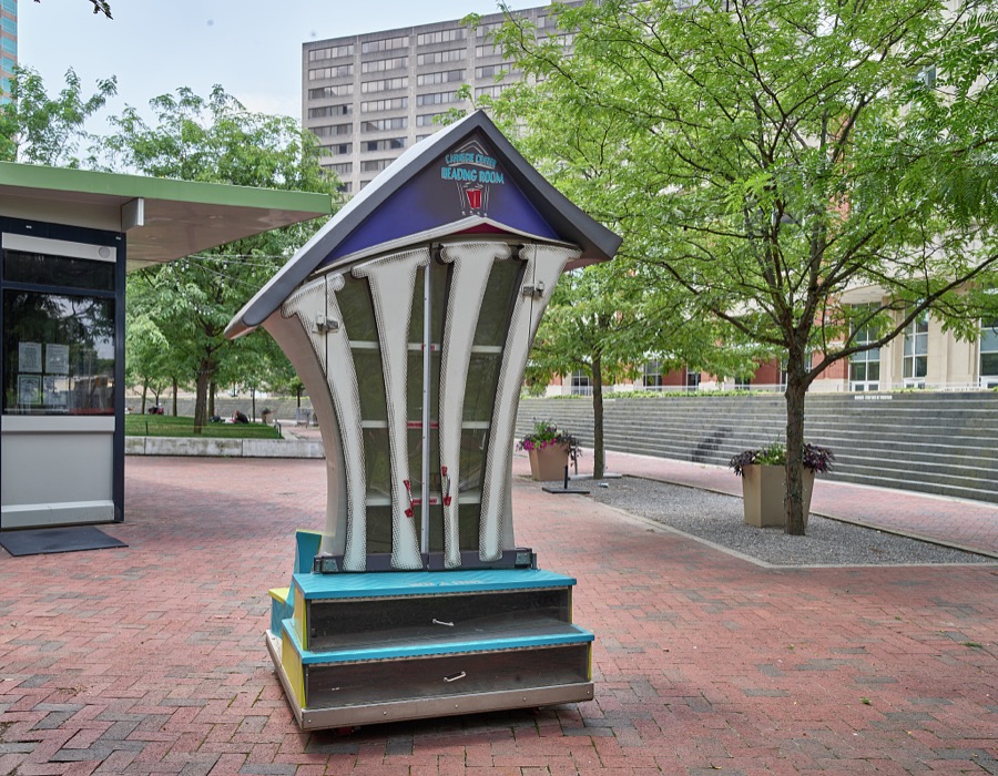 The whimsical Reading Center, a large version of "litle free libraries" where passersby may leave or take a free book, in the courtyard of Triangle Park in downtown Lexington, Kentucky