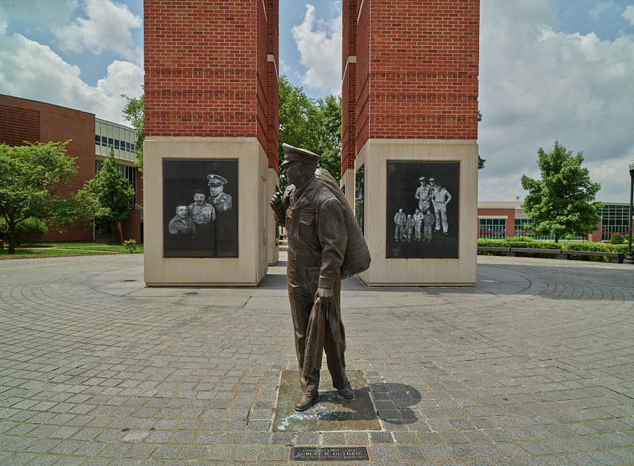 Sculptor Russ Faxon's statue of U.S. Army Sgt. 1st Class Robert H. Guthrie beneath the Guthrie Bell Tower at Western Kentucky University in Bowling Green, Kentucky