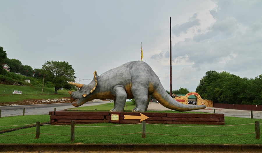 A fairly cute, rather than menacing, Triceratops at Dinosaur World, one of several old-style roadside attractions in tiny Cave City, Kentucky, which is also home to a number of vintage hostelries for weary traveling families near Mammoth Cave National Park, one of the earliest tourist attrations in America