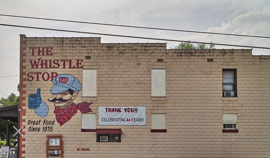 Sign for the Whistle Stop Cafe, just around the corner from the railroad tracks in tiny Glendale, Kentucky, a somewhat unchanged town full of late-19th and early-20th Century homes and small businesses