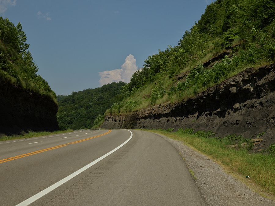 Curve through a cut in the mountains outside Hazard, a coal town of 4,500 or so population in southeastern Kentucky
