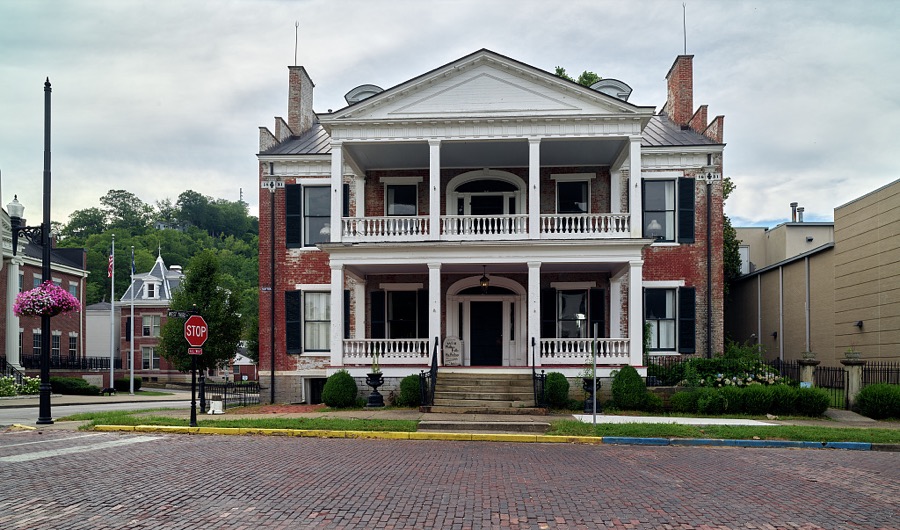 The house known as "Phillips' Folly" in Maysville, Kentucky, an Ohio River port city that, although home to fewer than 10,000 people, was several times a boomtown, shipping coal, tobacco, and wrought iron that decorated fashionable balconies as far away as New Orleans, Louisiana's, French Quarter