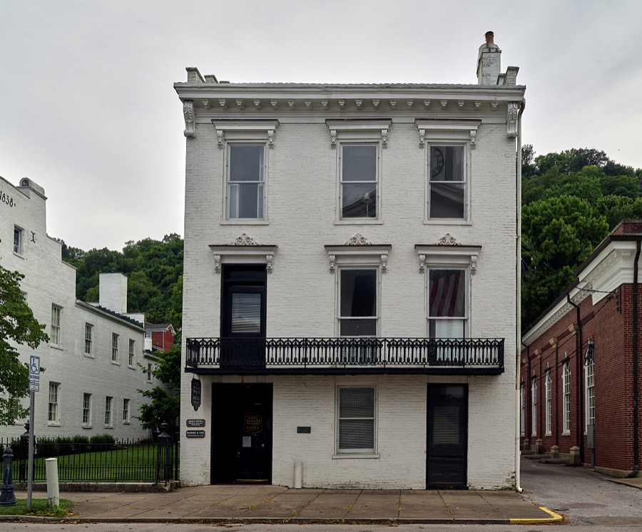 Building in Maysville, Kentucky, an Ohio River port city that, although home to fewer than 10,000 people, was several times a boomtown, shipping coal from mines to the south, so much tobacco that it ranked second in the world in looseleaf variety shipments, and wrought iron that decorated fashionable balconies as far away as New Orleans, Louisiana's, French Quarter