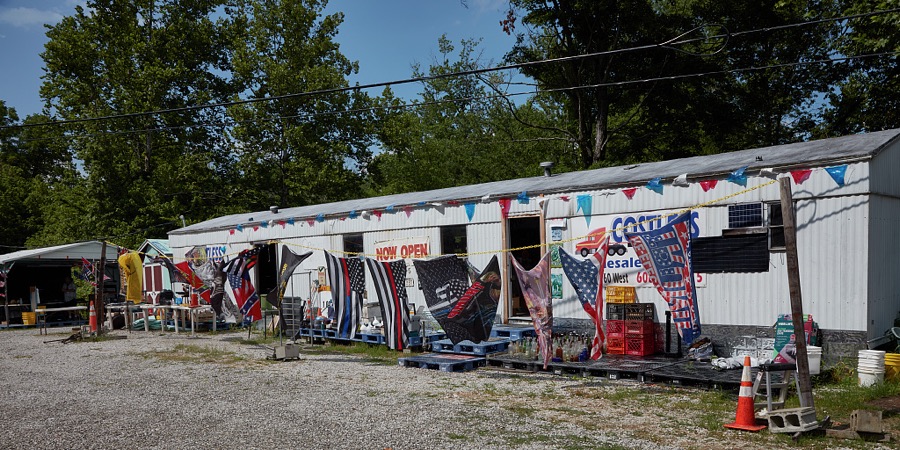 The Triplet Creek Produce outlet, which seems to be selling more rugs and flags than melons and corn, nea Morehead, a community in northeastern Kentucky