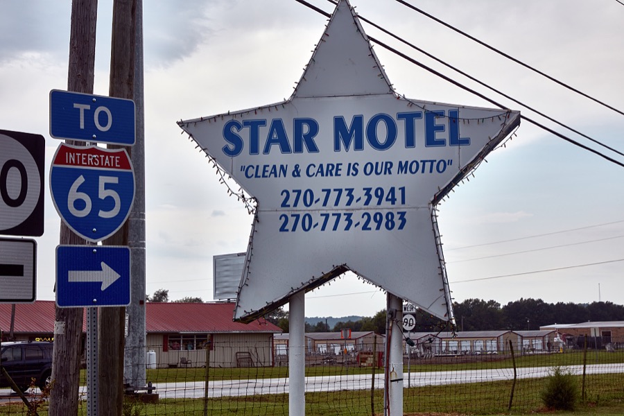 A sign shaped like the name of the establishment it advertises, the Star Motel in tiny Cave City, Kentucky, which is home to a number of vintage hostelries for weary traveling families near Mammoth Cave National Park, one of the earliest tourist attrations in America