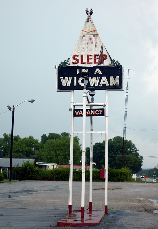 Sign at the oldest surviving Wigwam Village Motel, one of a series of quirky motels stretching from here in Cave City, Kentucky, to heavily traveled U.S. Route 66 in Arizona