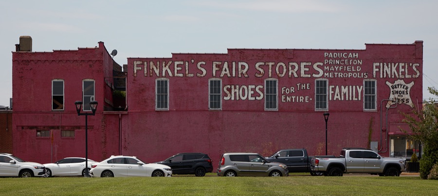 Vintage advertising sign for "Finkel's Fair Stores" on the side of a building in Paducah, a Kentucky city at the confluence of the Ohio and Tennessee rivers