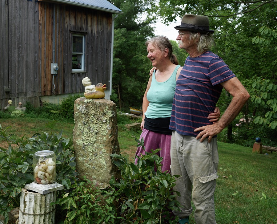 Cecil and Bet Ison (and little friends) at a most unusual folk-art installation, the "Home for Wayward Babydolls" in the Rowan County, Kentucky rural settlement of Elliottsville, near Morehead
