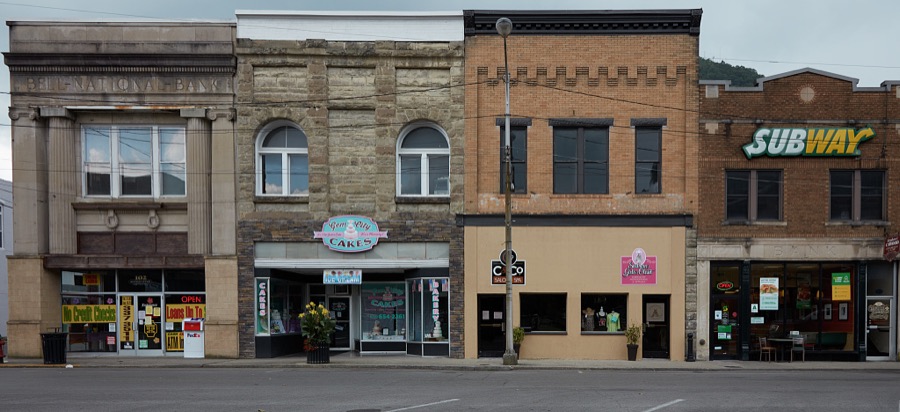 Downtown block, including the Gem City Cakes shop, in Pineville, Kentucky, near the Cumberland Gap National Historical Park