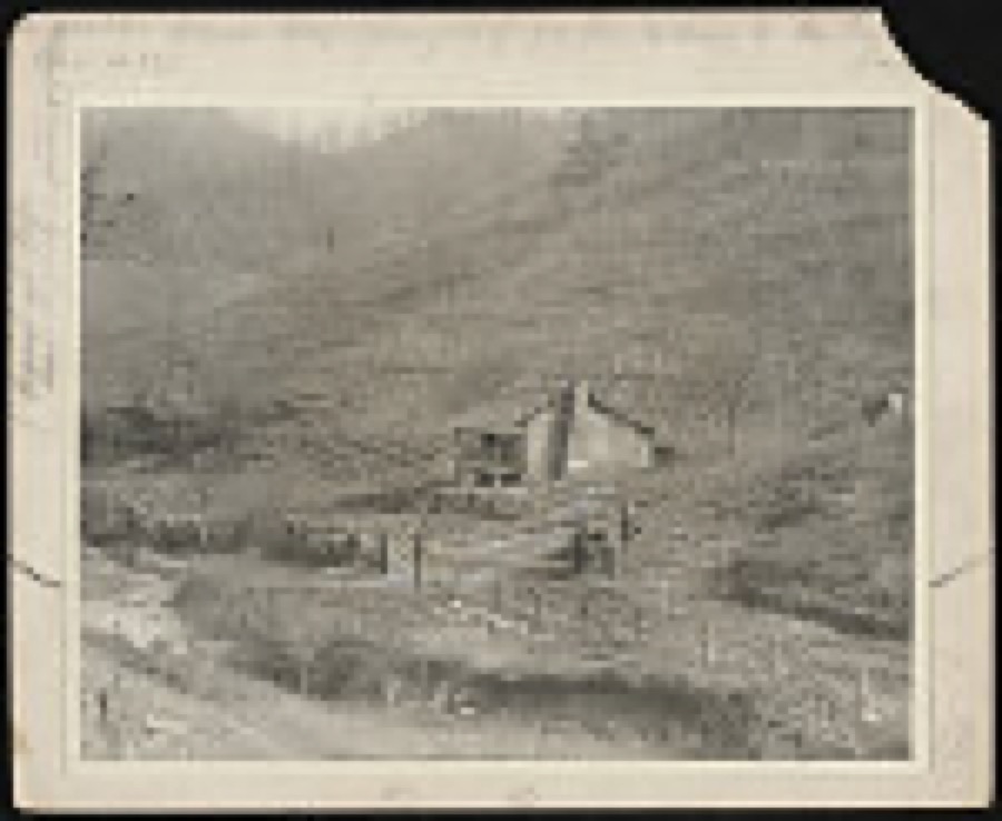 Typical home of a small, independent farmer in the Kentucky mountains. The mud sled is a necessary means of transportation in the winter months