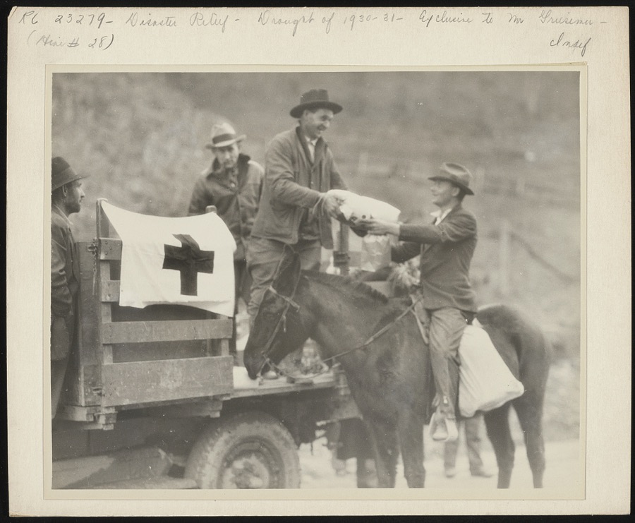 Down from his mountain farm near Betsy Lane [i.e. Layne], Kentucky, came this young farmer, to apply for and receive his first public charity, in the form of food from the Red Cross. Drought ruined his crops, mines had closed down last November and no work was to be had