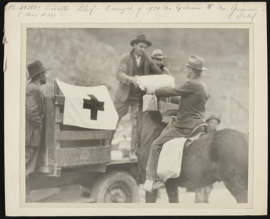 Down from his mountain farm near Betsy Lane [i.e. Layne], Kentucky, came this young farmer, to apply for and receive his first public charity, in the form of food from the Red Cross. Drought ruined his crops, mines had closed down last November and no work was to be had