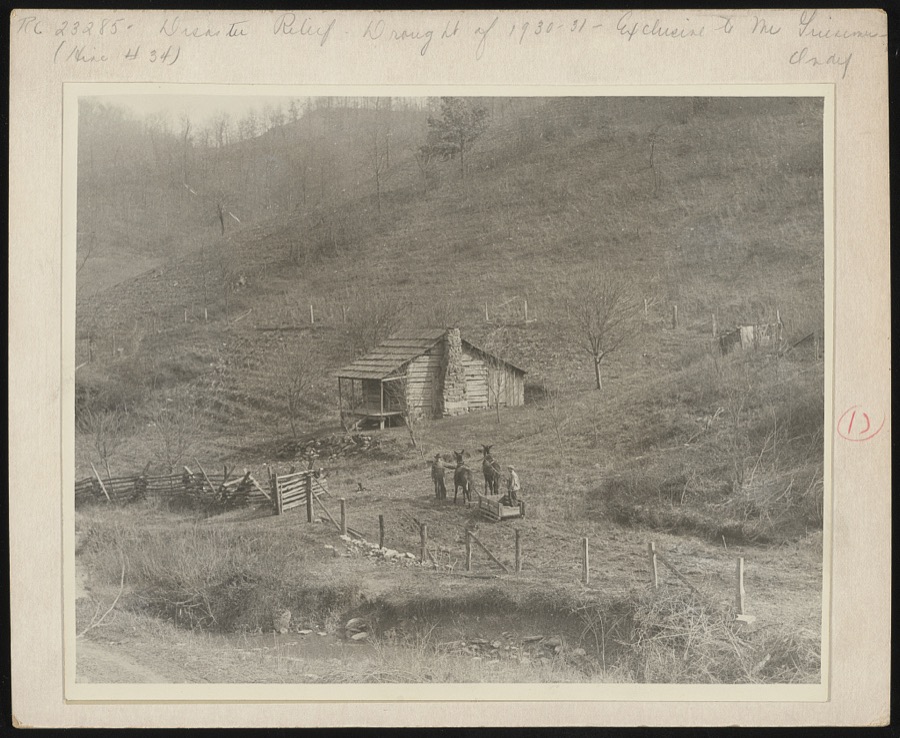 Typical home of a small, independent farmer in the Kentucky mountains. The mud sled is a necessary means of transportation in the winter months