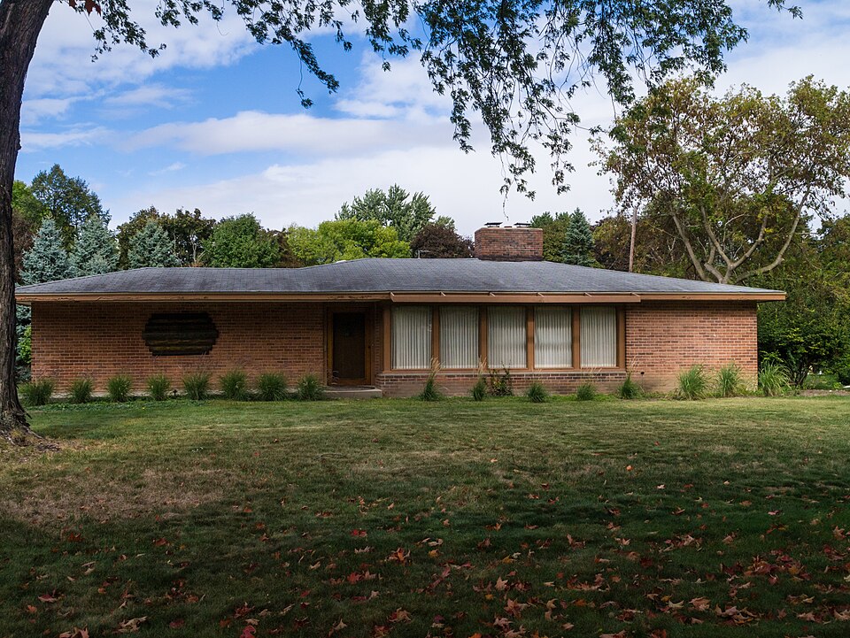Photograph of Mr. and Mrs. Louis P. Butenschoen House
