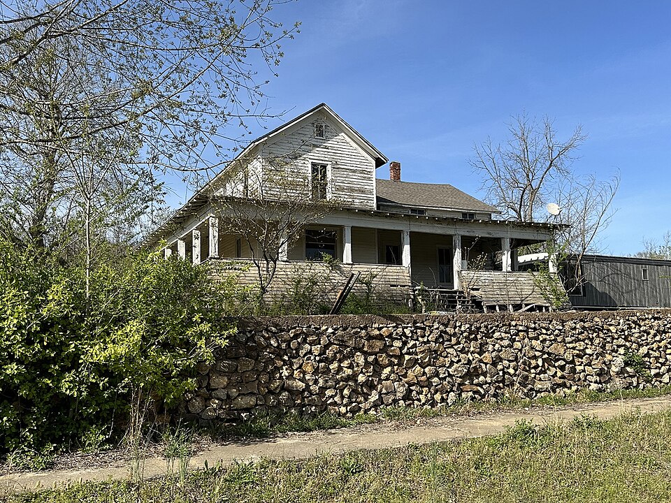Photograph of Mrs. Louis Bedell House
