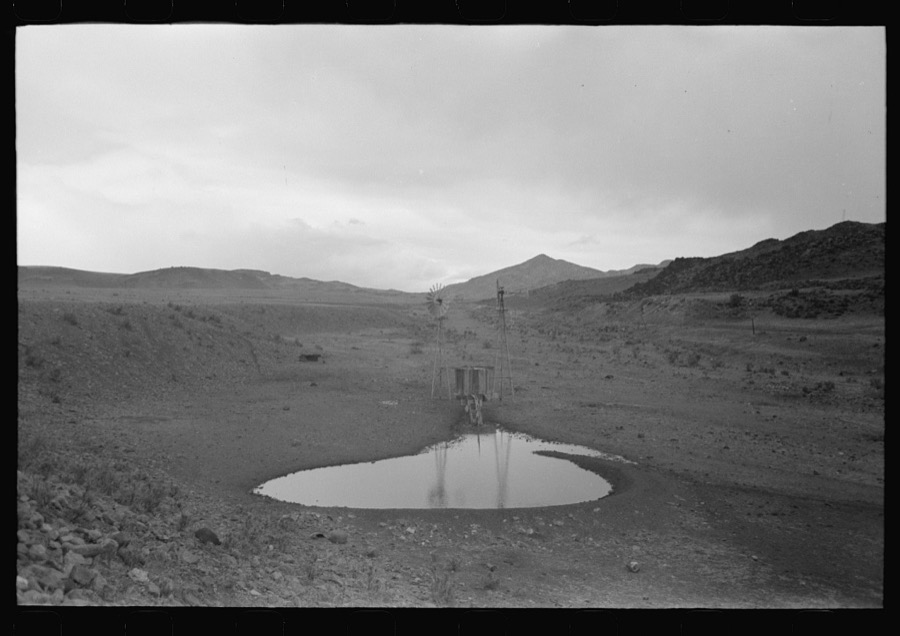 Stock waterhole and windmill, Socorro County, New Mexico