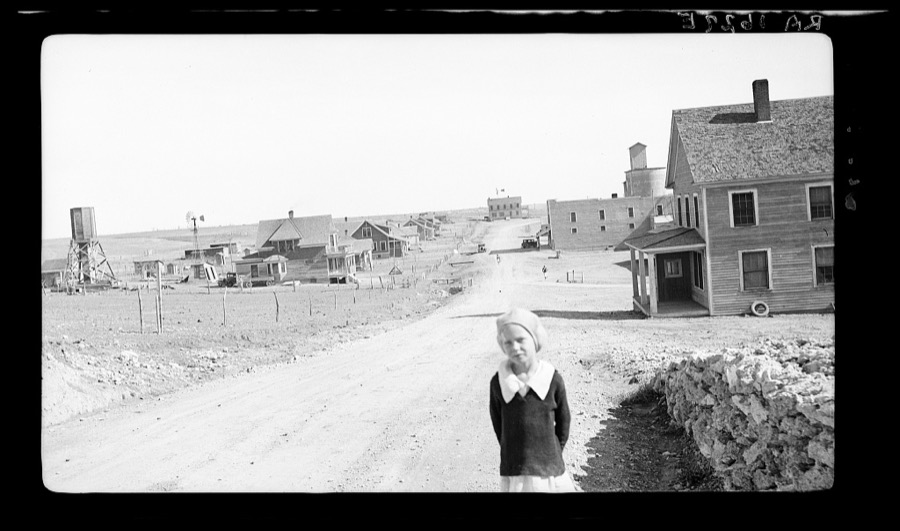 The town of Mills, New Mexico. The grain elevator in background at right has been long ago abandoned. The bank is closed